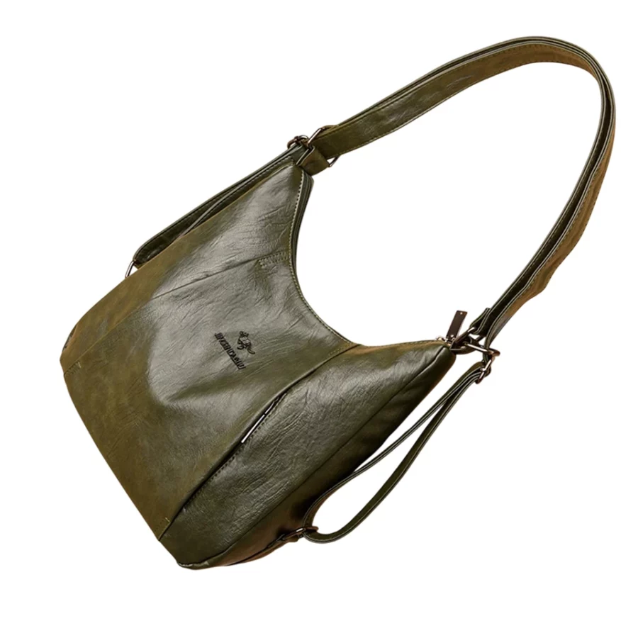 Stilren grön axelväska i praktisk design. Rymlig shopper som passar både shopping, arbete och resor. Lätt att matcha med olika outfits.